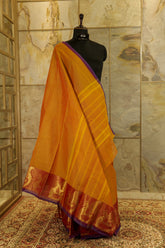 Dual tone Orange-purple chettinad cotton saree with broad Jari border with beautiful peacock figures woven on one border